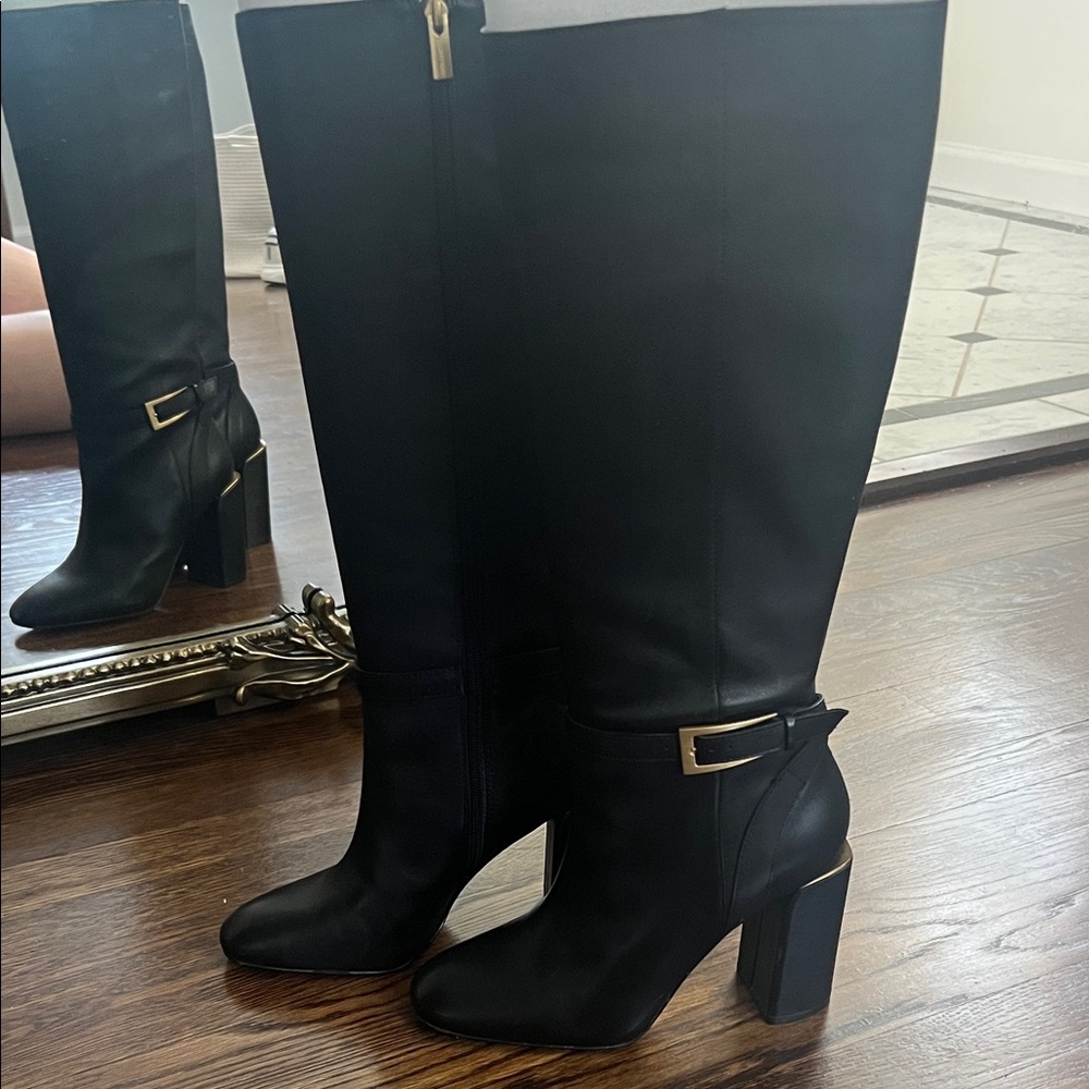 Vince Camuto Black Leather Heeled Boots with Gold Accent.